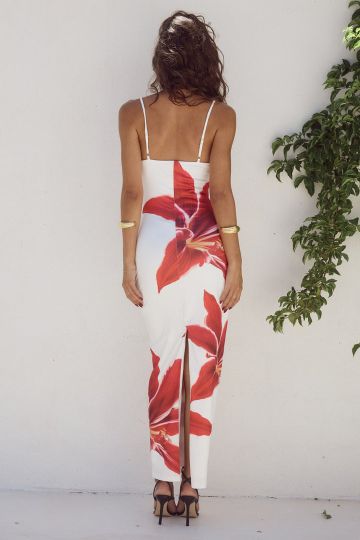Ella Bloemenjurk in wit, achteraanzicht; midi-jurk met delicate bloemenprint en luxe uitstraling.